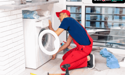 Man Repairing Washing Machine